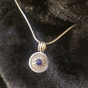 Elegant Silver Pendant Necklace with Blue Accent